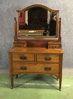 Dressing table similar to this but has an extra full width drawer...